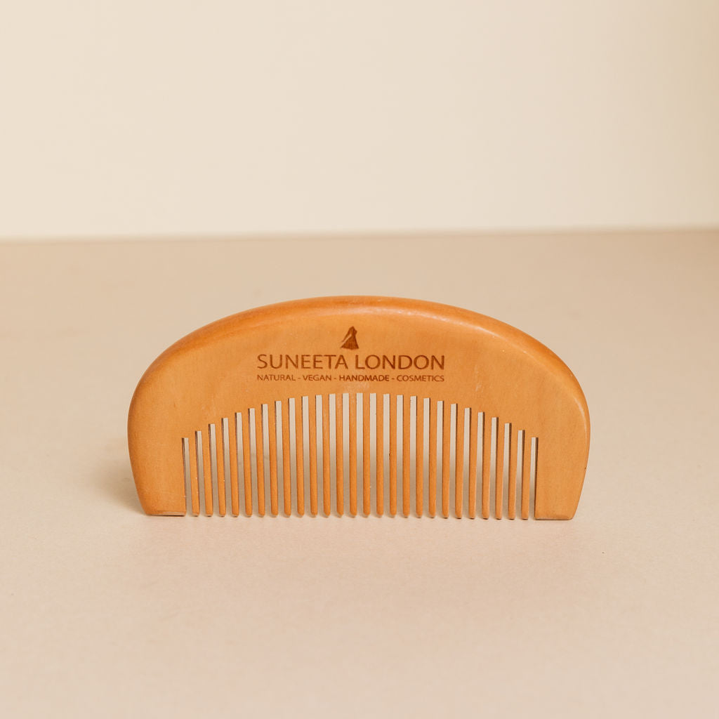 beech wood comb with suneeta London logo engraved , suitable for hair and beard, can be used applying suneeta London's hair oil