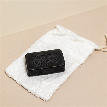 charcoal soap on soap bag