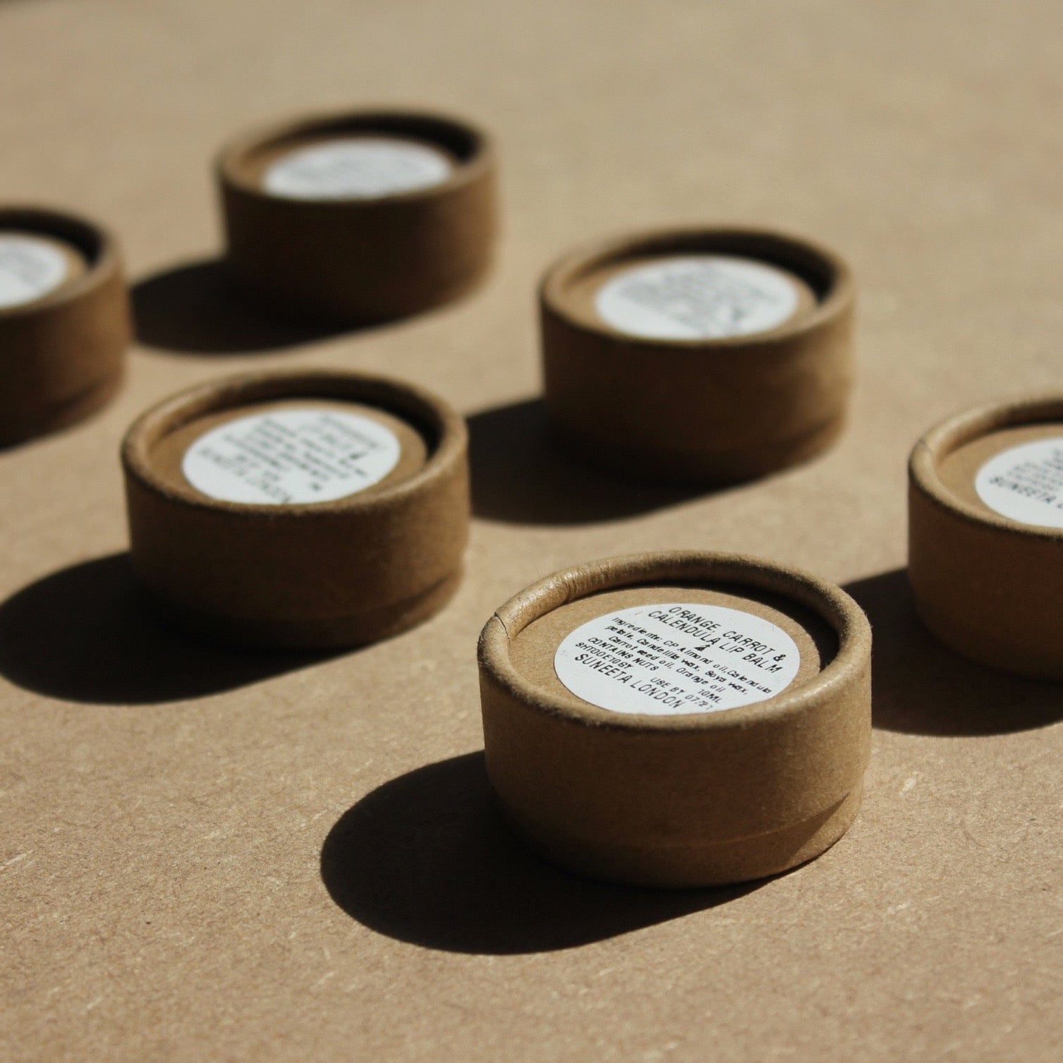 vegan lip balm, natural lip balm, sustainable packaging, cardboard packaging, rosy lip balm, spf lip balm, lip balm, suneeta lip balm, lip salve, peppermint lip balm, plump lips, lavomango, suneeta London, suneeta cosmetics